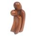 'Hand-Carved Suar Wood Sculpture of Parent and Child'