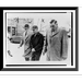 Historic Framed Print [Ed Gein (center) handcuffed being led by police officials to a state crime lab in Madison Wisconsin] 17-7/8 x 21-7/8