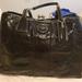 Coach Bags | Coach #15658 Black Patent Leather Signature Stitched Framed Carryall Black | Color: Black/Blue | Size: Os