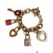 Victoria's Secret Jewelry | Chunky Gold And Pink Charm Bracelet By Victoria’s Secret. | Color: Gold/Pink | Size: Os