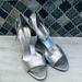 Nine West Shoes | Nine West Silver 4-Inch T-Strap Let's Get This Party Started Heels | Color: Silver | Size: 7.5