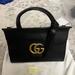 Gucci Bags | Calfskin Small Gg Marmont Top Handle Bag Black | Color: Black | Size: Os