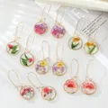 Boucles d'oreilles fleur séchée unique pour femmes boucles d'oreilles pendantes florales réelles