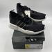 Adidas Shoes | Adidas Nmd R1 Black Gold Metallic Sneakers Fw6433, Women's Size 6 | Color: Black/Gold | Size: 6