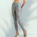 Free People Pants & Jumpsuits | Free People Movement High-Rise Serene Leggings Blue Feather Print Women’s L | Color: Blue/Brown | Size: L