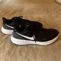 Nike Shoes | Men’s Nike Revolution Black Running Shoes. Size 12. New | Color: Black/White | Size: 12