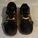 Under Armour Shoes | Black And Gold Under Armour Basketball Shoes Used But In Really Good Condition. | Color: Black/Gold | Size: 9
