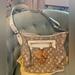 Louis Vuitton Bags | Louis Vuitton Tan And Cream Bucket Bag | Color: Cream/Tan | Size: Os