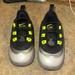 Nike Shoes | Baby/Toddler Nike Air Size 7 Highlighter Yellow Accents | Color: Black/Yellow | Size: 7bb