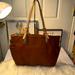 Michael Kors Bags | Michael Kors Camel Color, Large Tote Good Used Condition | Color: Brown/Tan | Size: 19” Length By 12.5” Height