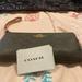 Coach Bags | Brand New Coach Signiture Large Wristlet Purse | Color: Brown/Pink | Size: Os