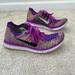 Nike Shoes | Nike Flyknit Running Shoes Size 7 | Color: Orange/Purple | Size: 7