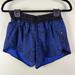Lululemon Athletica Shorts | Lululemon Tracker Sz 8 Womens Blue Paisley Zip Pocket 4 In Running Shorts | Color: Black/Blue | Size: 8