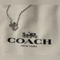 Coach Jewelry | Nwot Coach Signature Crystal Cluster Necklace Silver Tone | Color: Silver | Size: Os