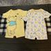 Disney One Pieces | Lot Of 2 Infant Boys 24 Months Disney Baby's Winnie The Pooh Bodysuits New | Color: White/Yellow | Size: 24mb