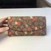 Coach Bags | Coach Cherry Signature Slim Envelope Wallet Khaki Multi F31562 | Color: Red/Tan | Size: Os