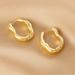 Anthropologie Jewelry | Gold Wavy Abstract Hoop Earrings | Color: Gold | Size: Os