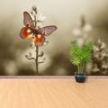 Schmetterling Blumen adhesivie oder traditionelles Wandbild | Wandbespannung Ein roter Schmetterling im stimmungsvollen sepiafarbenen Blumenfeld. Wand