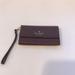 Kate Spade Bags | Kate Spade Iphone Case Wristlet Leather Wallet Pre- Owned Very Good Condition | Color: Purple | Size: 6” X 3 1/2”