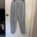 Under Armour Bottoms | Like New Under Armour Sweatpants Size Youth Xl Grey White Logo Pockets | Color: Gray | Size: Xlb