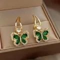Boucles d'oreilles pendantes papillon en argent 925 pour femmes boucles d'oreilles en cristal vert
