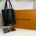 Louis Vuitton Bags | Louis Vuitton Epi Leather Bucket Pm Tote Bag | Color: Black | Size: Os