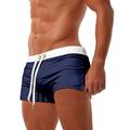 Per uomo Boxer da surf Pantaloncini da mare Boxer da mare Slip da bagno A cordoncino Vita elastica Tasca con cerniera Tinta unica Traspirante Asciugatura rapida Breve Informale Giornaliero Spiaggia