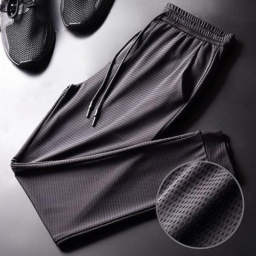 Herren Hose Hosen Abgeschnittene Hose Freizeithose Kordelzug Elastische Taille Einfarbig Atmungsaktiv Schnelltrocknend Outdoor Täglich Fitnessstudio Brautkleider schlicht sportlich Schwarz
