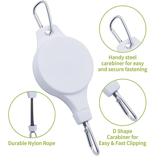 Pflanzenhakenrolle, einziehbarer Pflanzenaufhänger, Blumenkörbe und Vogelfutterspender hängen hoch oben und können heruntergezogen werden, um zu wässern oder zu füttern Image