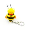 Innovative Cute Electronic Innovatice Keychain with Light and Sound (Yellow+Black)