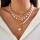 Collana girocollo con perle finte e catene spesse a strati per le donne Catene con perline tendy sul collo Accessori 2023 Gioielli di moda