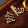 Muylinda Baroque Style Metallic Brooch Vintage Harp Birdcage Brooches and Pins Clothes Suit Clip Pin