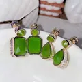 High-quality Women Light Luxury Peridot Green gem Earrings Side Micro-inlaid Purple Cubic Zirconia