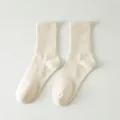 Mid -tube men's manufacturers wholesale mid -tube men's solid color adult socks sports socks and