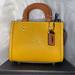 Coach Bags | Coach Leather Micro Mini Purse New | Color: Brown/Yellow | Size: Os