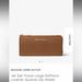 Michael Kors Bags | Michael Kors Jet Set Travel Large Saffiano Leather Quarter-Zip Wallet | Color: Brown | Size: Os