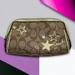 Coach Bags | Coach Signature Heritage Star Graphic Coated Canvas Cosmetics Case - “Daina” | Color: Brown/Gold | Size: Os