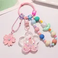 Süße rosa Blume Schlüssel anhänger mit Perlenkette koreanische Ins Stil Mädchen Schlüssel ringe