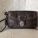 Coach Bags | Coach Pebbled Leather Wristlet 2 Compartments Zip Top And Flap Over W Turn Lock | Color: Brown/Silver | Size: Os