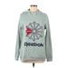 Reebok Pullover Hoodie: Green Print Tops - Women's Size Medium