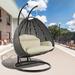 Bungalow Rose Samaira Wicker Hanging 2 person Egg Swing Chair Wicker/Rattan in Black | Wayfair DAB8ACE96EB8461AA0E0D3B708938CF7