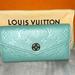 Louis Vuitton Bags | Louis Vuitton Grained Monogram Empreinte Leather With Flower Press Stud Closure | Color: Blue | Size: Os