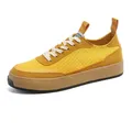 Nuovo stile coreano scarpe di tela gialla da uomo Sneakers stile Harajuku scarpe vulcanizzate