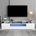 Ivy Bronx UV High-Gloss TV Stand w/ Push To Open Doors & LED Color Changing Lights For Tvs Up To 80", Solid Wood in White | Wayfair