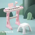 Piano de taille moyenne à 37 touches avec rouleur et chaise piano électronique pour enfants