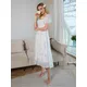 Robe maxi blanche à fleurs pour femmes manches courtes style boho sexy pour la plage élégante