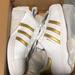Adidas Shoes | Adidas Super Star Youth Sneakers Size 38 | Color: Gold | Size: 5.5b