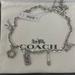 Coach Jewelry | Coach 5 Charm Silver Necklace. | Color: Silver | Size: Os