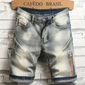 Short en Jean Vintage pour Homme Pantalon en Denim Style Hip Hop Droit Dilapidé au Genou