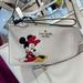 Kate Spade Bags | Kate Spade Disney X Kate Spade New York Minnie Medium L-Zip Wristlet Nwt | Color: Black/White | Size: Medium